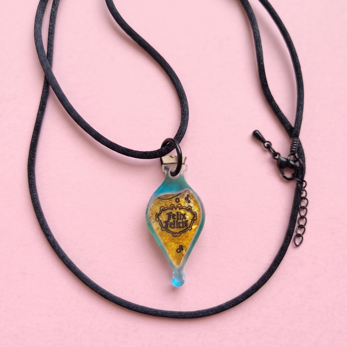 Collar o Pin Felix Felicis