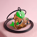 Collar o Pin Tomberi